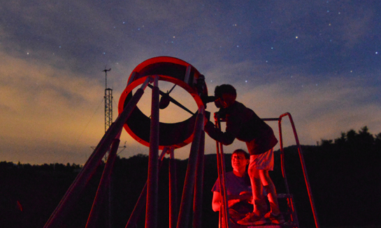 25" Optical telescope observing at night