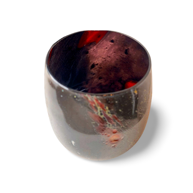 A glass with the depths of the cosmos, by Hayden Wilson